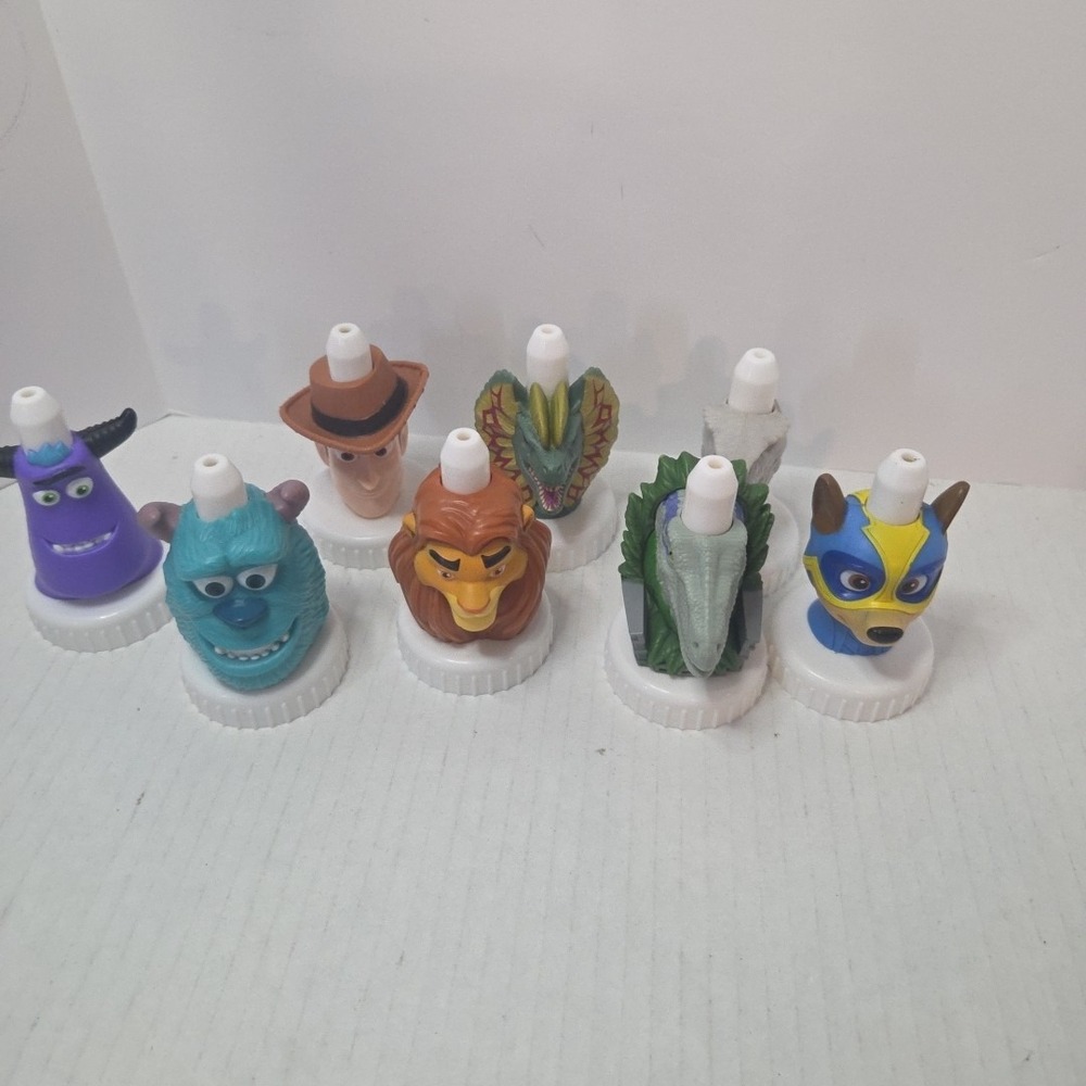Good 2 Grow Mixed Lot of 8 Collectible Juice Toppers Sully, Simba, Jarassic Park